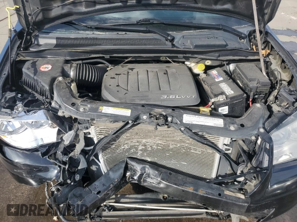 2011 Chrysler Town & Country Touring L with VIN 2A4RR8DG9BR666358, listed as a Copart auction lot 52525225 with 115,936 mi miles and Salvage Title. Bid and sale history available at carsss.com. Image 12.