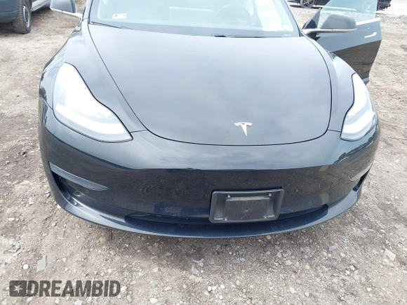 2019 Tesla Model 3 Mid Range with VIN 5YJ3E1EA2KF395549, listed as a IAAI auction lot 41895977 with 97,108 mi miles and . Bid and sale history available at carsss.com. Image 6.