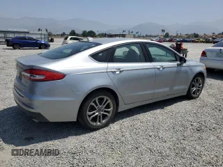 2020 Ford Fusion SEL z VIN 3FA6P0CD3LR196210, wystawiony jako Copart lot #60240925 z przebiegiem 81 768 mil mil oraz Szkoda całkowita • Salvage title. Historia ofert i sprzedaży dostępna na DreamBid. Obrazek 3.