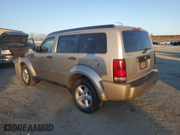 2010 Dodge Nitro SE z VIN 1D4PT2GK0AW104045, wystawiony jako Copart lot #46216635 z przebiegiem 170 533 mil mil oraz Szkody całkowita. Historia ofert i sprzedaży dostępna na DreamBid. Obrazek 2.