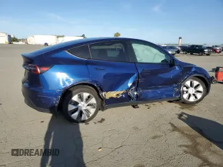 2022 Tesla Model Y Long Range z VIN 7SAYGDEE4NF408202, wystawiony jako Copart lot #51790905 z przebiegiem 43 509 mil mil oraz Szkody całkowita. Historia ofert i sprzedaży dostępna na DreamBid. Obrazek 3.