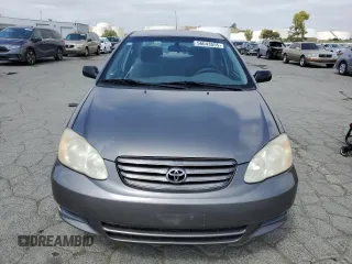2004 Toyota Corolla CE with VIN 1NXBR32E24Z304630, listed as a Copart auction lot 56043555 with 159,342 mi miles and Salvage Title. Bid and sale history available at DreamBid. Image 5.