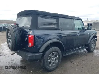 2021 Ford Bronco with VIN 1FMDE5BH8MLA83132, listed as a IAAI auction lot 41729825 with 31,192 mi miles and . Bid and sale history available at DreamBid. Image 4.