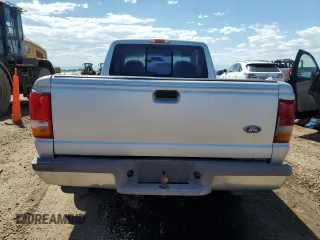 1995 Ford Ranger XL z VIN 1FTCR14A0SPA28290, wystawiony jako Copart lot #61943475 z przebiegiem 210 000 mil mil oraz Czysty tytuł • Clean title. Historia ofert i sprzedaży dostępna na DreamBid. Obrazek 6.
