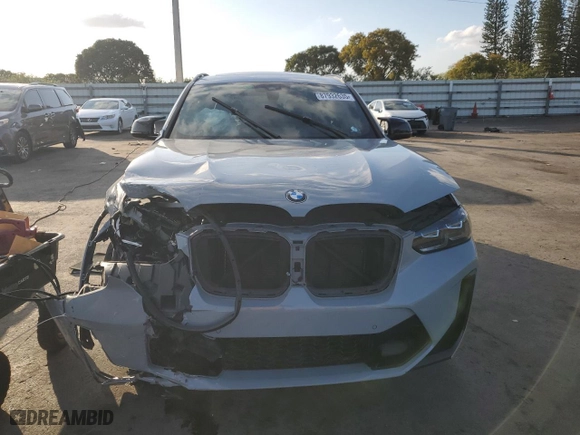 2022 BMW X4 M with VIN 5YM23EC00N9L35827, listed as a Copart auction lot 87932635 with 0 miles and Salvage Title. Bid and sale history available at carsss.com. Image 5.