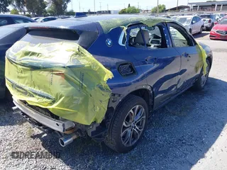 2018 BMW X2 sDrive28i z VIN WBXYJ3C31JEP76135, wystawiony jako IAAI lot #42136753 z przebiegiem 21 377 mil mil oraz . Historia ofert i sprzedaży dostępna na DreamBid. Obrazek 4.