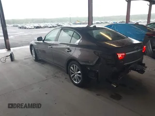 2015 Infiniti Q50 Premium z VIN JN1BV7AR0FM393387, wystawiony jako IAAI lot #42257850 z przebiegiem 176 436 mil mil oraz . Historia ofert i sprzedaży dostępna na DreamBid. Obrazek 3.