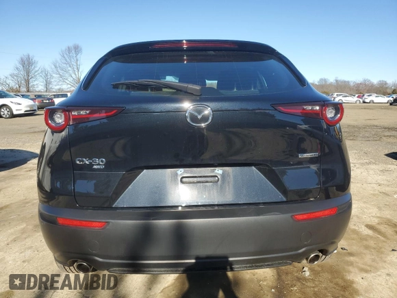 2024 Mazda CX-30 S with VIN 3MVDMBAM0RM635991, listed as a Copart auction lot 48979595 with 11,640 mi miles and Salvage title. Bid and sale history available at DreamBid. Image 6.