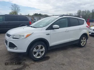 2013 Ford Escape SE with VIN 1FMCU9GX7DUA96986, listed as a IAAI auction lot 42160197 with 193,189 mi miles and . Bid and sale history available at DreamBid. Image 2.