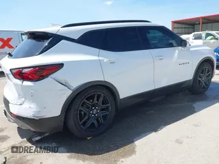 2022 Chevrolet Blazer LT z VIN 3GNKBDRS0NS135906, wystawiony jako IAAI lot #42070239 z przebiegiem 127 017 mil mil oraz . Historia ofert i sprzedaży dostępna na DreamBid. Obrazek 4.
