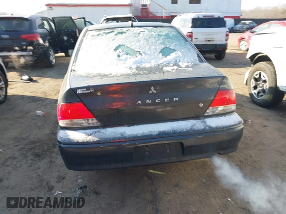 2002 Mitsubishi Lancer LS with VIN JA3AJ36E42U080614, listed as a IAAI auction lot 41397554 with 187,981 mi miles. Bid and sale history available at carsss.com. Image 16.
