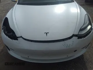 2020 Tesla Model 3 Standard Range Plus with VIN 5YJ3E1EA0LF597839, listed as a IAAI auction lot 41639219 with 49,220 mi miles. Bid and sale history available at carsss.com. Image 10.