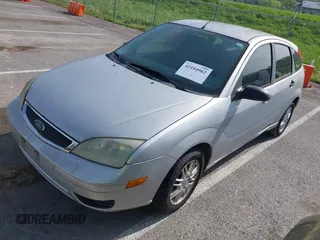 2006 Ford Focus S z VIN 1FAHP37N46W190690, wystawiony jako IAAI lot #42104962 z przebiegiem 159 875 mil mil oraz . Historia ofert i sprzedaży dostępna na DreamBid. Obrazek 2.