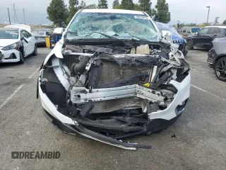 2021 Chevrolet Traverse LT Cloth с VIN 1GNERGKW4MJ180564, выставлен на аукционе Copart как лот 50919915 с пробегом Не указан миль и Списание • Salvage title. История ставок и продаж доступна на DreamBid. Изображение 5.