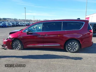 2023 Chrysler Pacifica Hybrid Limited with VIN 2C4RC1S7XPR518695, listed as a IAAI auction lot 41301401 with 24,433 mi miles and . Bid and sale history available at DreamBid. Image 14.