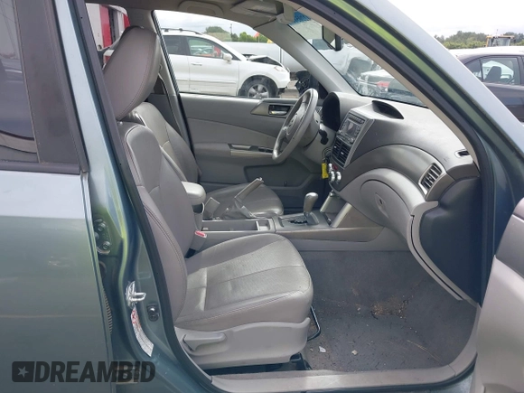 2009 Subaru Forester X Limited z VIN JF2SH64679H745265, wystawiony jako IAAI lot #42205180 z przebiegiem 173 852 mil mil oraz . Historia ofert i sprzedaży dostępna na DreamBid. Obrazek 5.