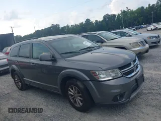 2013 Dodge Journey SXT with VIN 3C4PDCBG7DT568284, listed as a IAAI auction lot 42508928 with 215,803 mi miles and . Bid and sale history available at DreamBid. Image 13.