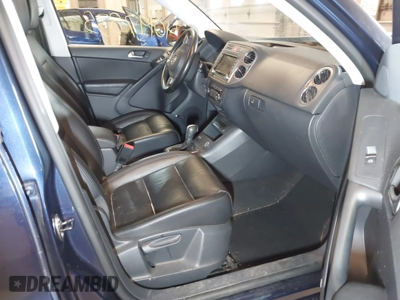 2011 Volkswagen Tiguan SE with VIN WVGBV7AXXBW533872, listed as a IAAI auction lot 40197835 with 104,685 mi miles and . Bid and sale history available at DreamBid. Image 5.