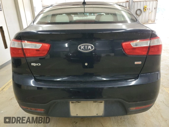 2012 Kia Rio LX with VIN KNADM4A34C6072811, listed as a Copart auction lot 68295334 with 77,167 mi miles and Salvage Title. Bid and sale history available at DreamBid. Image 6.