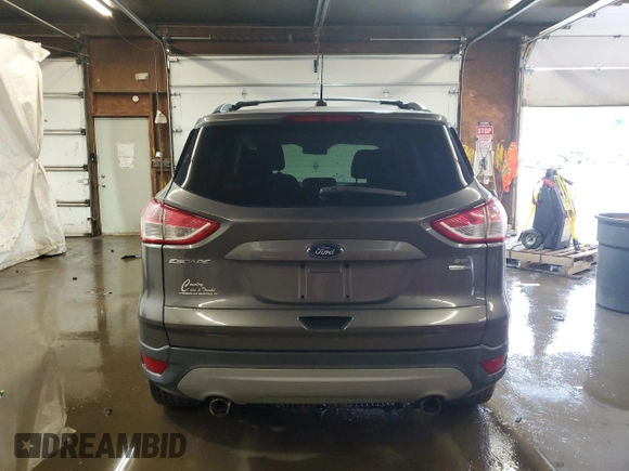 2013 Ford Escape SE with VIN 1FMCU9GX9DUC12835, listed as a Copart auction lot 60865625 with Not provided miles and Clean title. Bid and sale history available at DreamBid. Image 6.