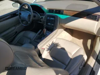 1998 Lexus SC 300 z VIN JT8CD32Z5W1004027, wystawiony jako Copart lot #48164775 z przebiegiem 132 030 mil mil oraz Szkody całkowita. Historia ofert i sprzedaży dostępna na DreamBid. Obrazek 8.