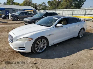 2013 Jaguar XJ Portfolio with VIN SAJWJ2GD0D8V47547, listed as a Copart auction lot 75913474 with 142,005 mi miles and Salvage Title. Bid and sale history available at DreamBid. Image 1.
