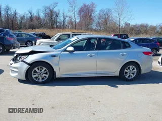 2016 Kia Optima LX with VIN 5XXGT4L37GG084538, listed as a IAAI auction lot 41784807 with 128,928 mi miles. Bid and sale history available at carsss.com. Image 14.