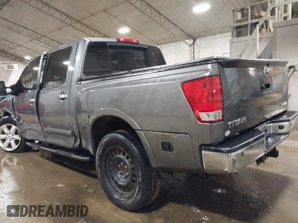 2014 Nissan Titan S with VIN 1N6AA0EC6EN513801, listed as a IAAI auction lot 41762295 with 128,412 mi miles and . Bid and sale history available at DreamBid. Image 3.