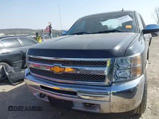 2013 Chevrolet Silverado 1500 LT with VIN 1GCRKSE77DZ267690, listed as a IAAI auction lot 41801357 with 70,964 mi miles and . Bid and sale history available at DreamBid. Image 13.