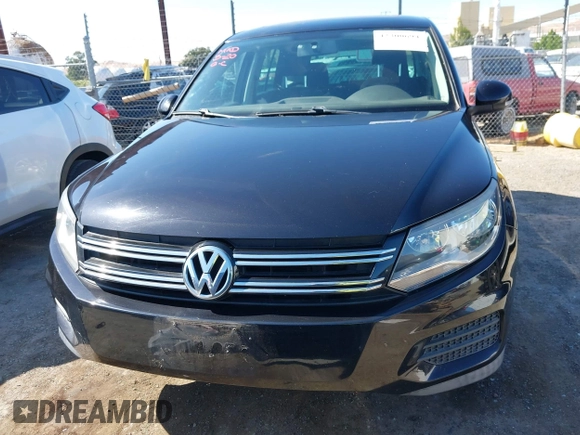 2012 Volkswagen Tiguan LE with VIN WVGAV7AX1CW557250, listed as a IAAI auction lot 42300694 with 122,310 mi miles and . Bid and sale history available at DreamBid. Image 12.