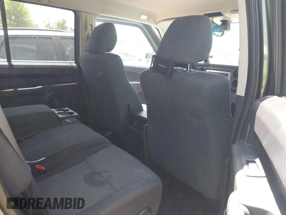 2008 Jeep Commander Sport z VIN 1J8HG48K88C232277, wystawiony jako IAAI lot #42582253 z przebiegiem 159 912 mil mil oraz . Historia ofert i sprzedaży dostępna na DreamBid. Obrazek 8.