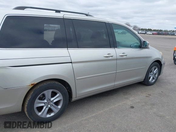 2008 Honda Odyssey Touring with VIN 5FNRL38928B109012, listed as a IAAI auction lot 41922712 with 241,589 mi miles. Bid and sale history available at carsss.com. Image 6.