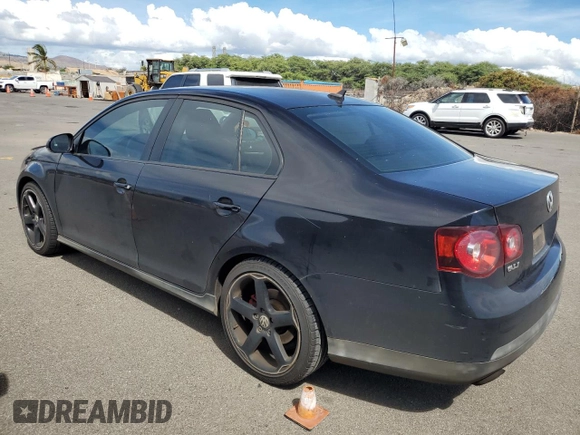 2009 Volkswagen Jetta GLI z VIN 3VWBJ71K19M071374, wystawiony jako Copart lot #77714284 z przebiegiem 61 434 mil mil oraz Szkoda całkowita • Salvage title. Historia ofert i sprzedaży dostępna na DreamBid. Obrazek 2.