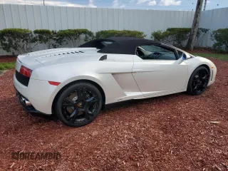 2012 Lamborghini Gallardo z VIN ZHWGU6BZ7CLA11933, wystawiony jako Copart lot #74679154 z przebiegiem Nie podano mil oraz Szkody całkowita. Historia ofert i sprzedaży dostępna na DreamBid. Obrazek 3.