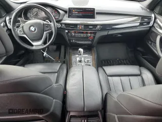 2018 BMW X5 xDrive40e iPerformance with VIN 5UXKT0C57J0V99079, listed as a Copart auction lot 44621905 with 57,556 mi miles and Salvage Title. Bid and sale history available at carsss.com. Image 8.