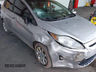 2013 Ford Fiesta SE with VIN 3FADP4EJ2DM173842, listed as a IAAI auction lot 42048262 with 82,637 mi miles. Bid and sale history available at carsss.com. Image 6.