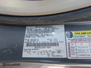 2011 Ford Fusion Hybrid with VIN 3FADP0L36BR114063, listed as a IAAI auction lot 42013961 with 141,255 mi miles. Bid and sale history available at carsss.com. Image 9.