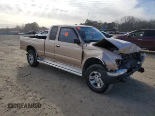 1999 Toyota Tacoma PreRunner with VIN 4TASM92N5XZ559667, listed as a Copart auction lot 89322855 with 233,037 mi miles and Salvage title. Bid and sale history available at DreamBid. Image 4.