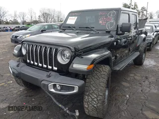 2022 Jeep Gladiator High Altitude z VIN 1C6HJTFG1NL164764, wystawiony jako IAAI lot #41727357 z przebiegiem 28 222 mil mil oraz . Historia ofert i sprzedaży dostępna na DreamBid. Obrazek 19.