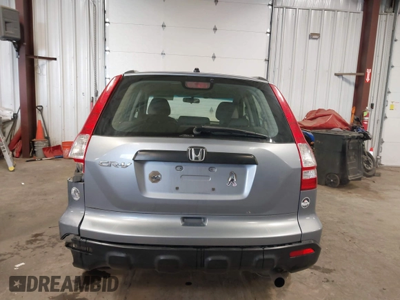 2009 Honda CR-V LX with VIN JHLRE48359C018488, listed as a IAAI auction lot 41824887 with 203,235 mi miles. Bid and sale history available at carsss.com. Image 16.