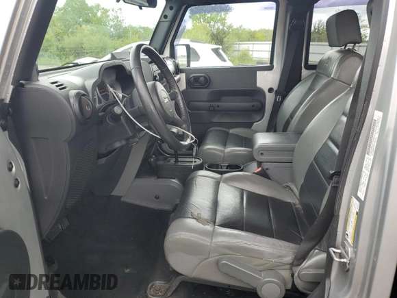 2010 Jeep Wrangler Unlimited Rubicon with VIN 1J4BA6H18AL222429, listed as a Copart auction lot 58348815 with 80,317 mi miles and Salvage title. Bid and sale history available at DreamBid. Image 7.