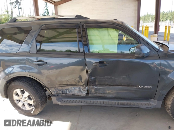 2009 Ford Escape Hybrid with VIN 1FMCU59389KB08343, listed as a IAAI auction lot 42520392 with 171,864 mi miles and . Bid and sale history available at DreamBid. Image 13.