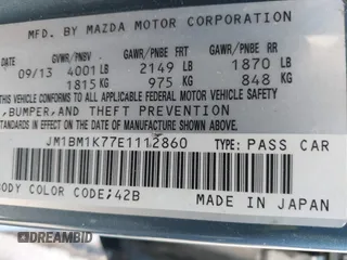 2014 Mazda 3 i Sport with VIN JM1BM1K77E1112860, listed as a IAAI auction lot 41331974 with 60,350 mi miles and . Bid and sale history available at carsss.com. Image 9.
