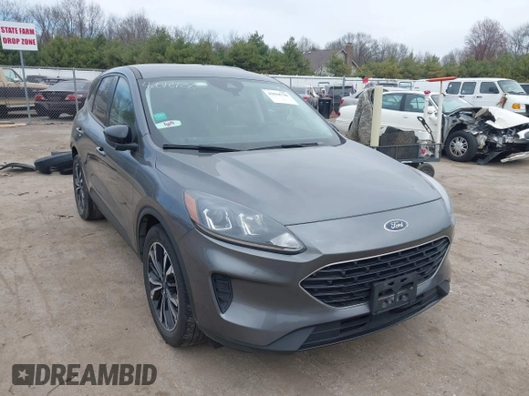 2021 Ford Escape SE z VIN 1FMCU0G62MUA94307, wystawiony jako IAAI lot #42018728 z przebiegiem 142 662 mil mil oraz . Historia ofert i sprzedaży dostępna na DreamBid. Obrazek 1.
