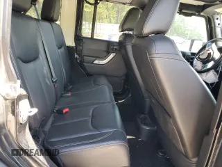 2016 Jeep Wrangler Unlimited Rubicon Hard Rock z VIN 1C4BJWFG6GL125252, wystawiony jako Copart lot #55241115 z przebiegiem 193 554 mil mil oraz Szkoda całkowita • Salvage title. Historia ofert i sprzedaży dostępna na DreamBid. Obrazek 10.