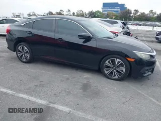 2016 Honda Civic Sedan EX-T with VIN 2HGFC1F34GH645220, listed as a IAAI auction lot 42043630 with 55,301 mi miles. Bid and sale history available at carsss.com. Image 13.