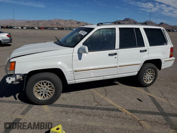 1995 Jeep Grand Cherokee Limited with VIN 1J4GZ78Y3SC701103, listed as a Copart auction lot 72038184 with 143,829 mi miles and Salvage Title. Bid and sale history available at carsss.com. Image 1.