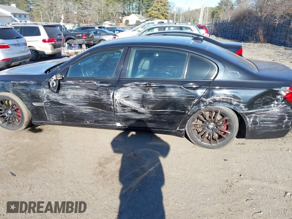 2015 BMW 7 Series 750Li xDrive with VIN WBAYF8C56FD654698, listed as a IAAI auction lot 41229313 with 120,238 mi miles and . Bid and sale history available at carsss.com. Image 14.