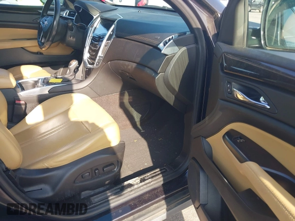 2014 Cadillac SRX Performance Collection with VIN 3GYFNCE39ES613051, listed as a IAAI auction lot 42113063 with 82,952 mi miles and . Bid and sale history available at carsss.com. Image 5.