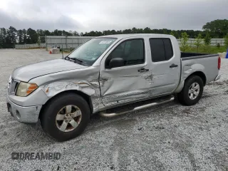 2010 Nissan Frontier SE with VIN 1N6AD0ER9AC415685, listed as a Copart auction lot 61579955 with 266,403 mi miles and Salvage title. Bid and sale history available at DreamBid. Image 1.